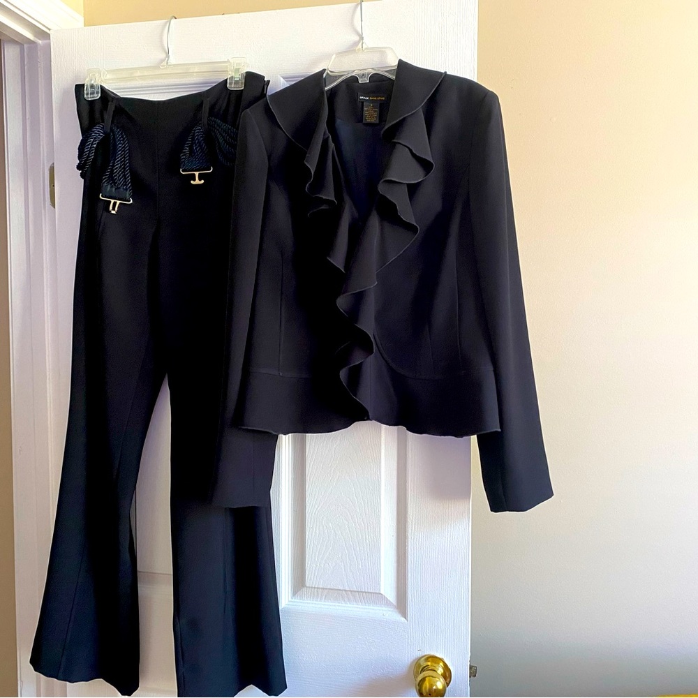 Pant suit color dark Navy fully lined like new worn once